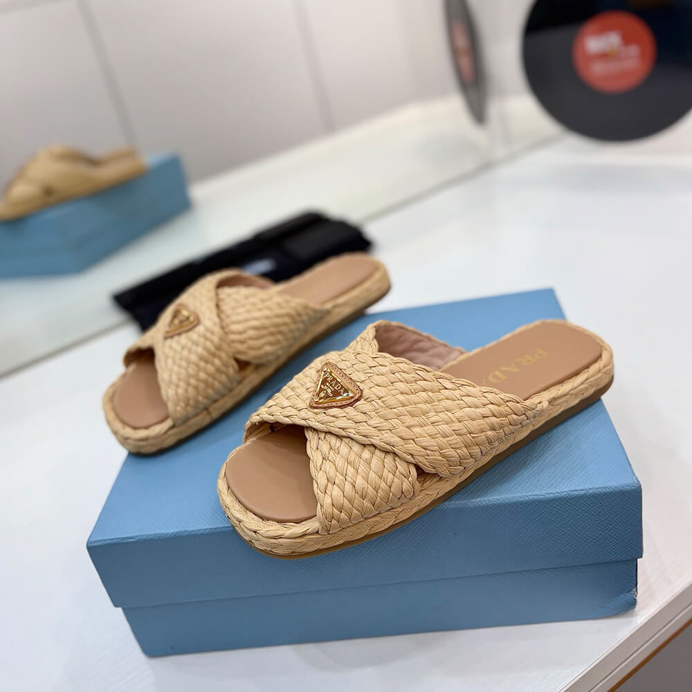 Prada Raffia crisscross slides