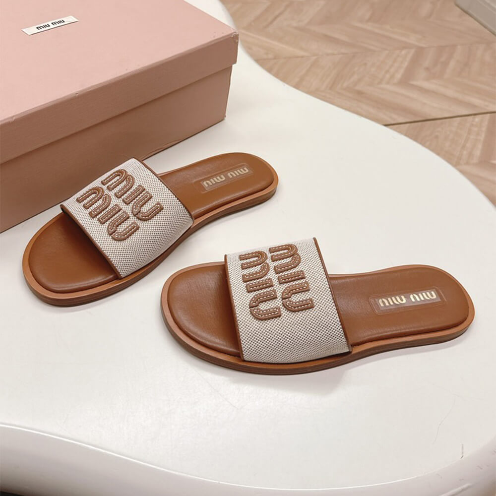 MiuMiu Canvas and leather slides